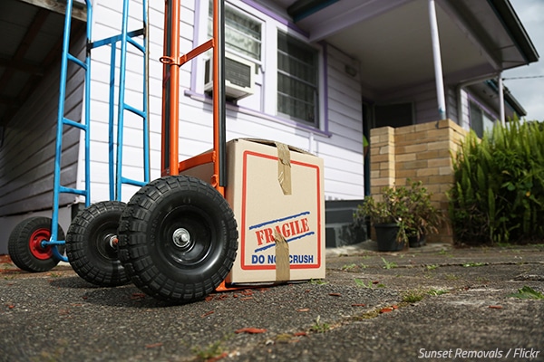 How do movers protect items when moving