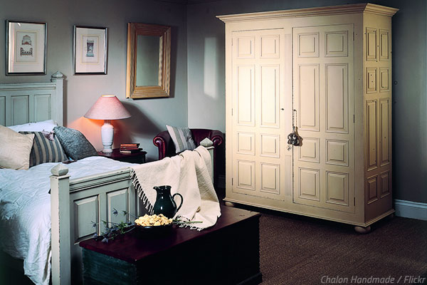 Moving a heavy wardrobe to a new home.